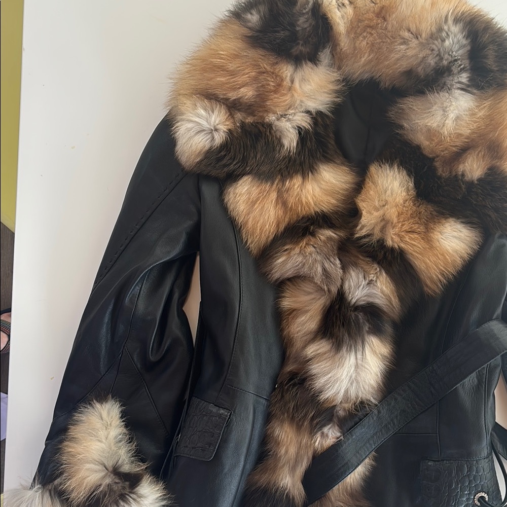 Luxurious Black Leather Jacket with Faux Fur Trim